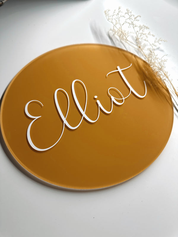 Round announcement plaque