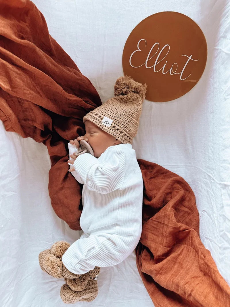 Round announcement plaque